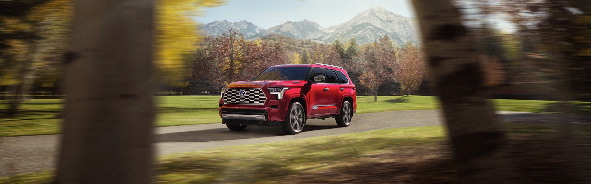 View of Red Sequoia driving on highway